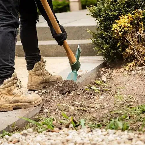 900mm Timber Handle Mattock in use - Cyclone | Australian Landscape Supplies