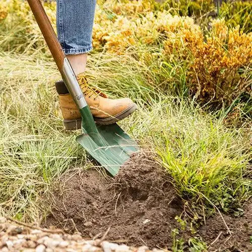 1450mm Square Mouth Post Hole Shovel in use digging a hole - Cyclone | Australian Landscape Supplies