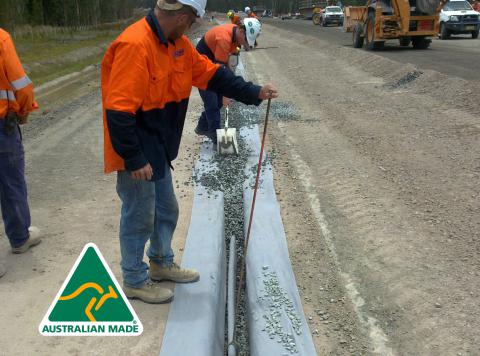 Geofabrics geotextile wrap installation with tradesman and agi pipe drainage 