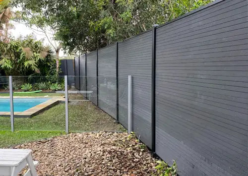 Betta Privacy Fence with pool and trees - Fitta fencing kits available from Australian Landscape Supplies