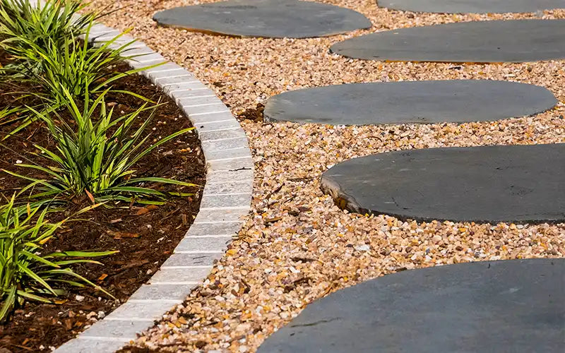 Bluestone Stepping Stones with Mixed Pebbles Available from Australia Landscape Supplies