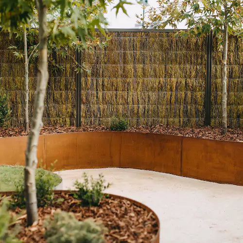 Straightcurve weathering steel retaining garden bed 